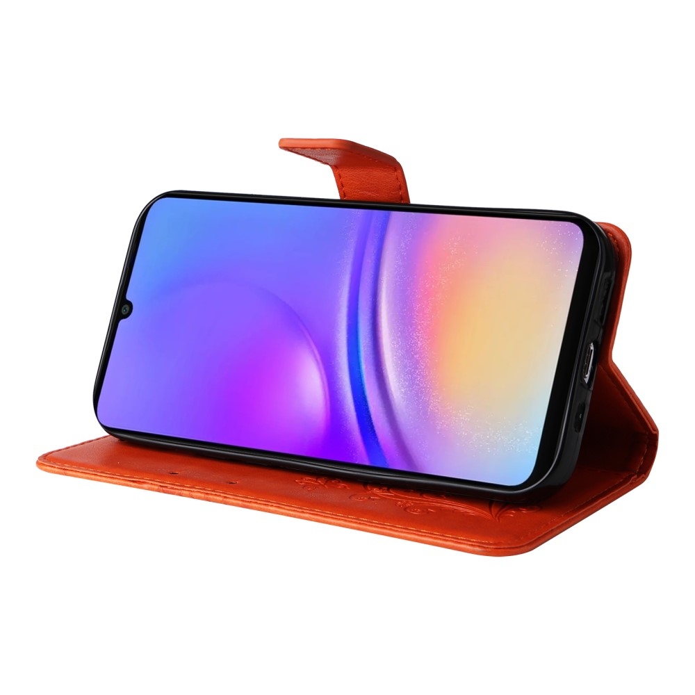 Big Butterfly knižkové púzdro na Samsung Galaxy A06 4G - oranžové