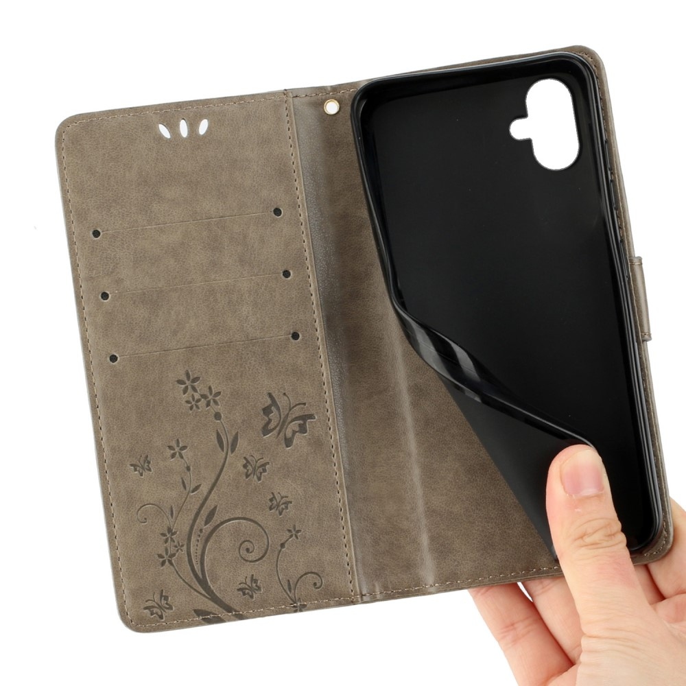 Flowers knižkové púzdro na Samsung Galaxy A06 4G - šedé