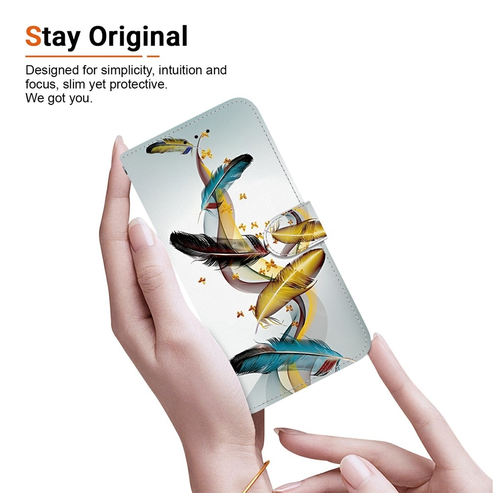Versatile knižkové púzdro na Xiaomi Redmi 15 4G (171mm) - zlatá a modrá pierka