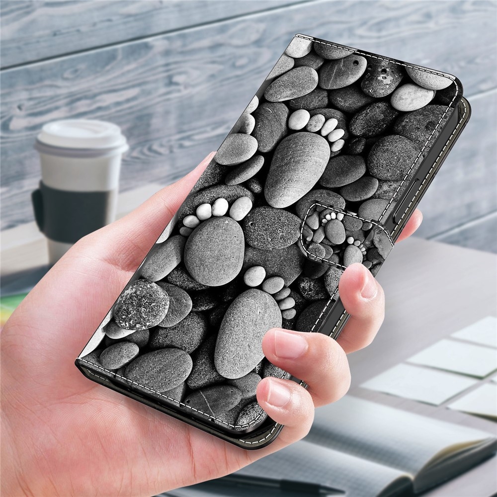 Firmly knižkové púzdro na Samsung Galaxy A17 5G/A26 5G - stopy z kameňa