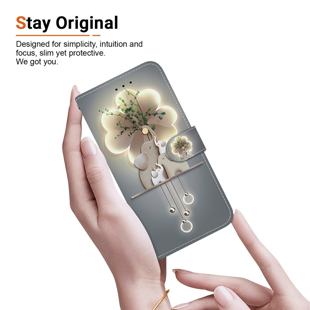 Versatile knižkové púzdro na Samsung Galaxy S26 FE - slony