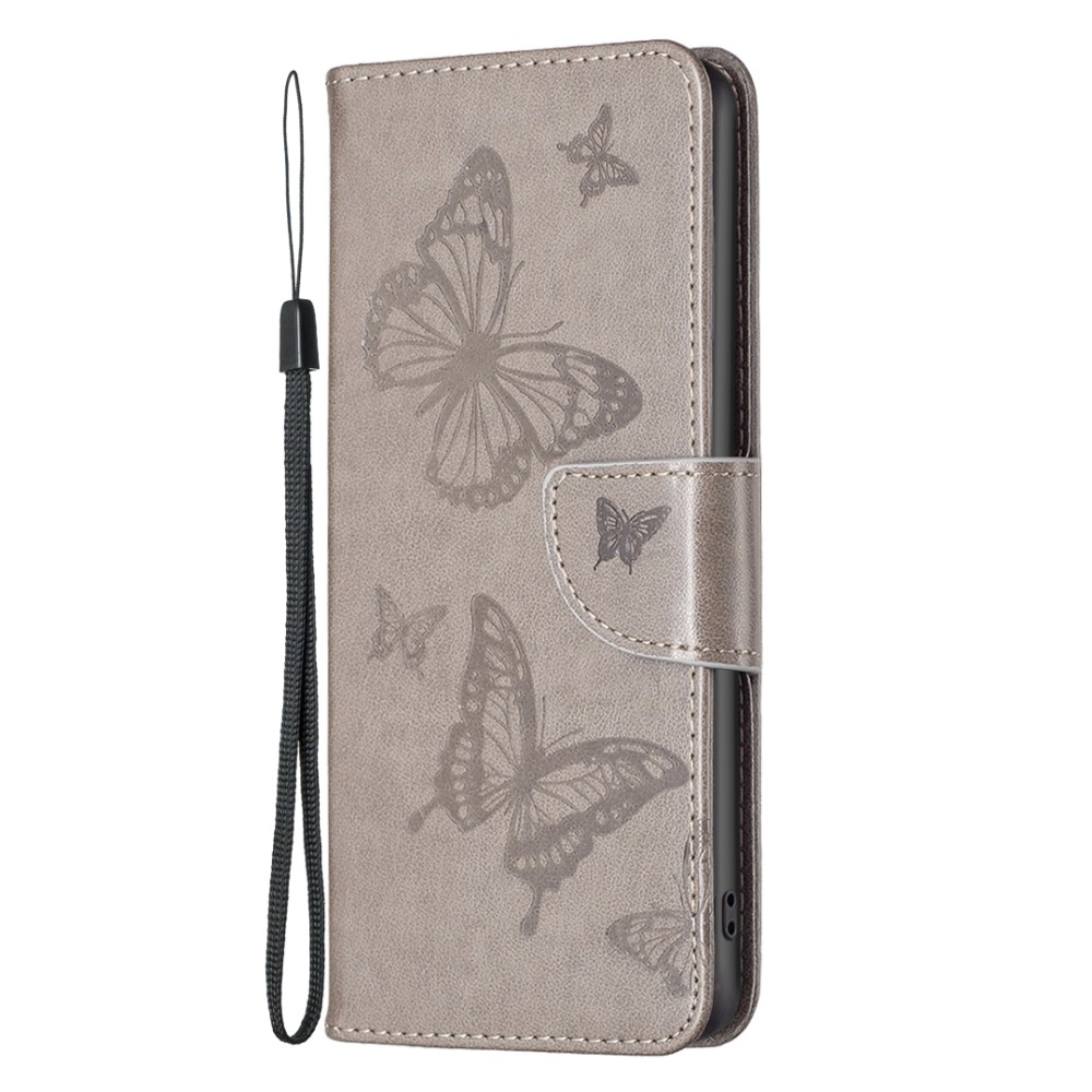 Butterfly knižkové puzdro na iPhone 15 - šedé