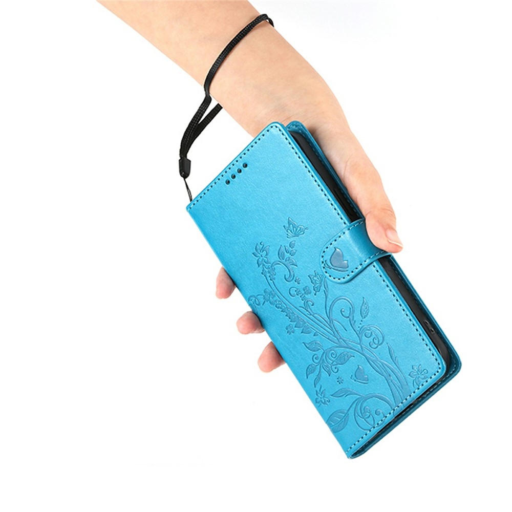 Flowery knižkové púzdro na Xiaomi Redmi 15 5G (169mm) - modré